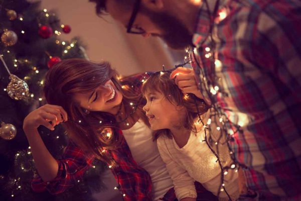 Family strings Christmas lights